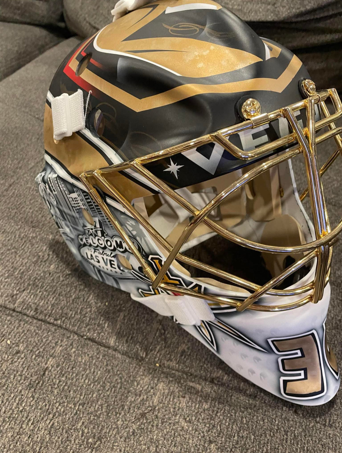Logan Thomson replica goalie mask with 24k plated cage