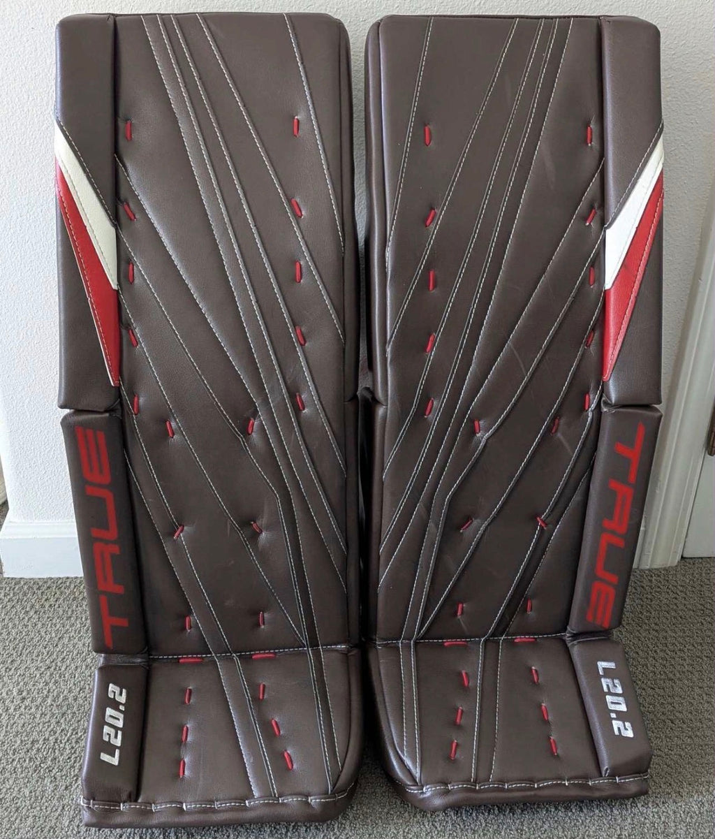 NCAA True L20.2 33+2 pro stock goalie pads and glove