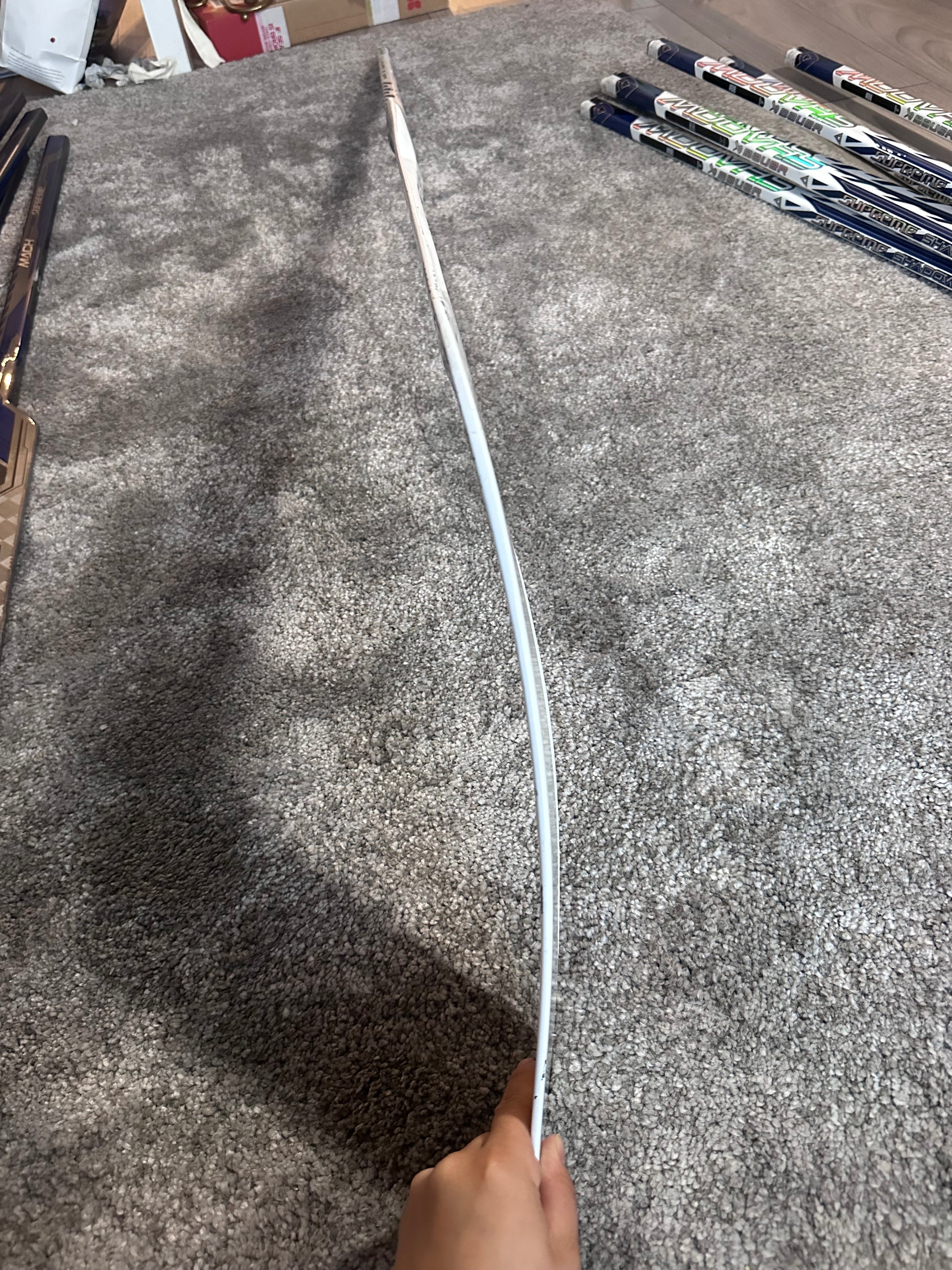 NCAA Bauer Shadow Full Right 24" White Pro Stock Goalie Stick #8