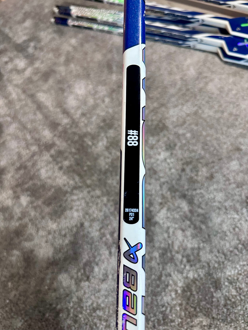 NCAA Bauer Shadow Full Right 24" White Pro Stock Goalie Stick #8