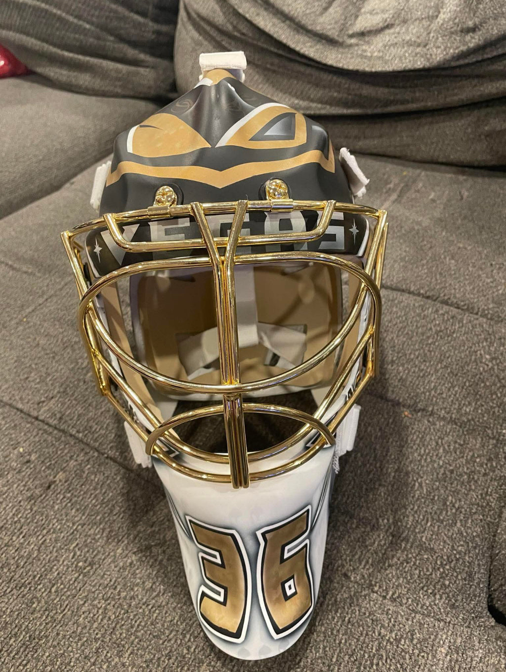 Logan Thomson replica goalie mask with 24k plated cage