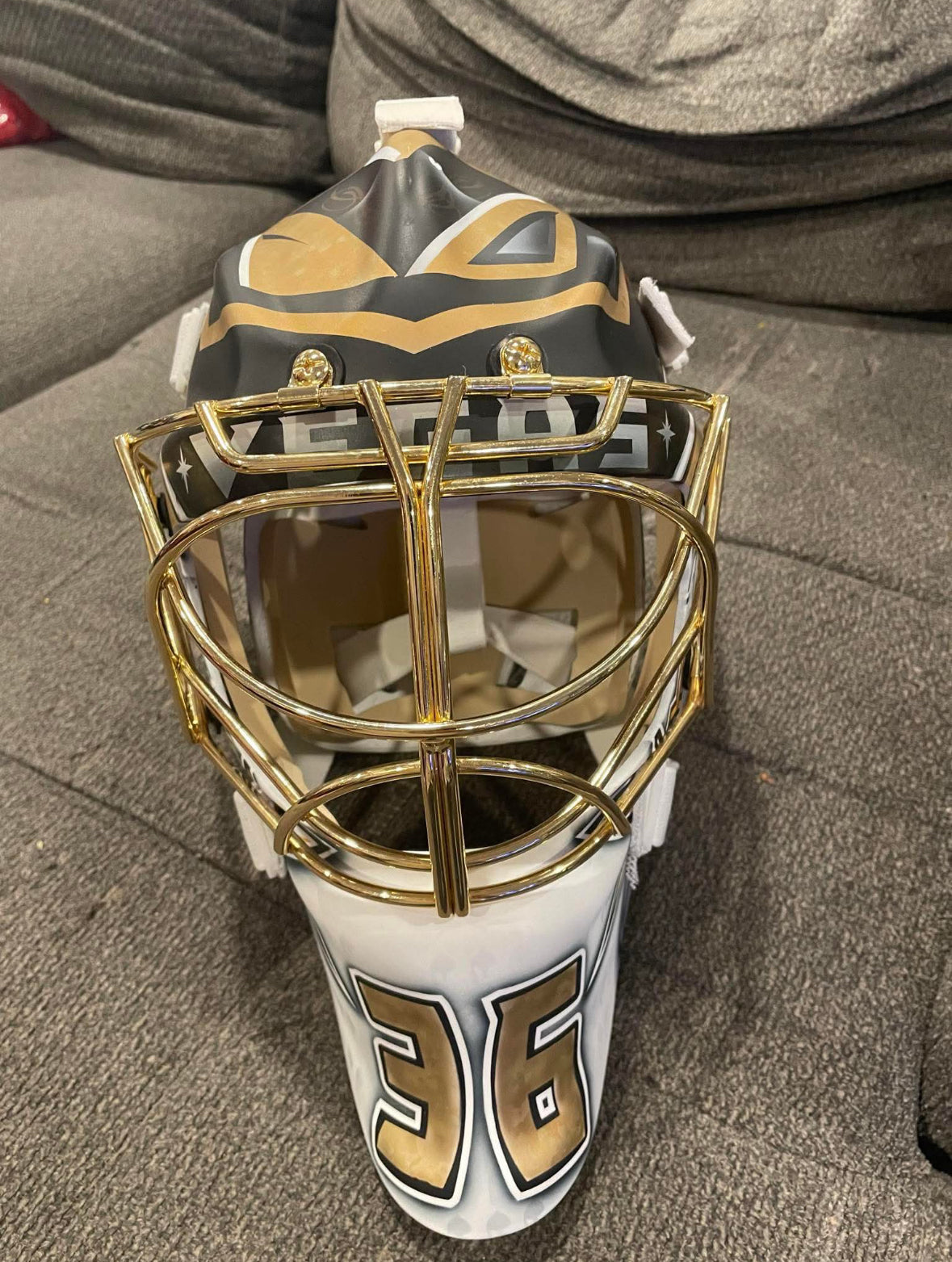 Logan Thomson replica goalie mask with 24k plated cage