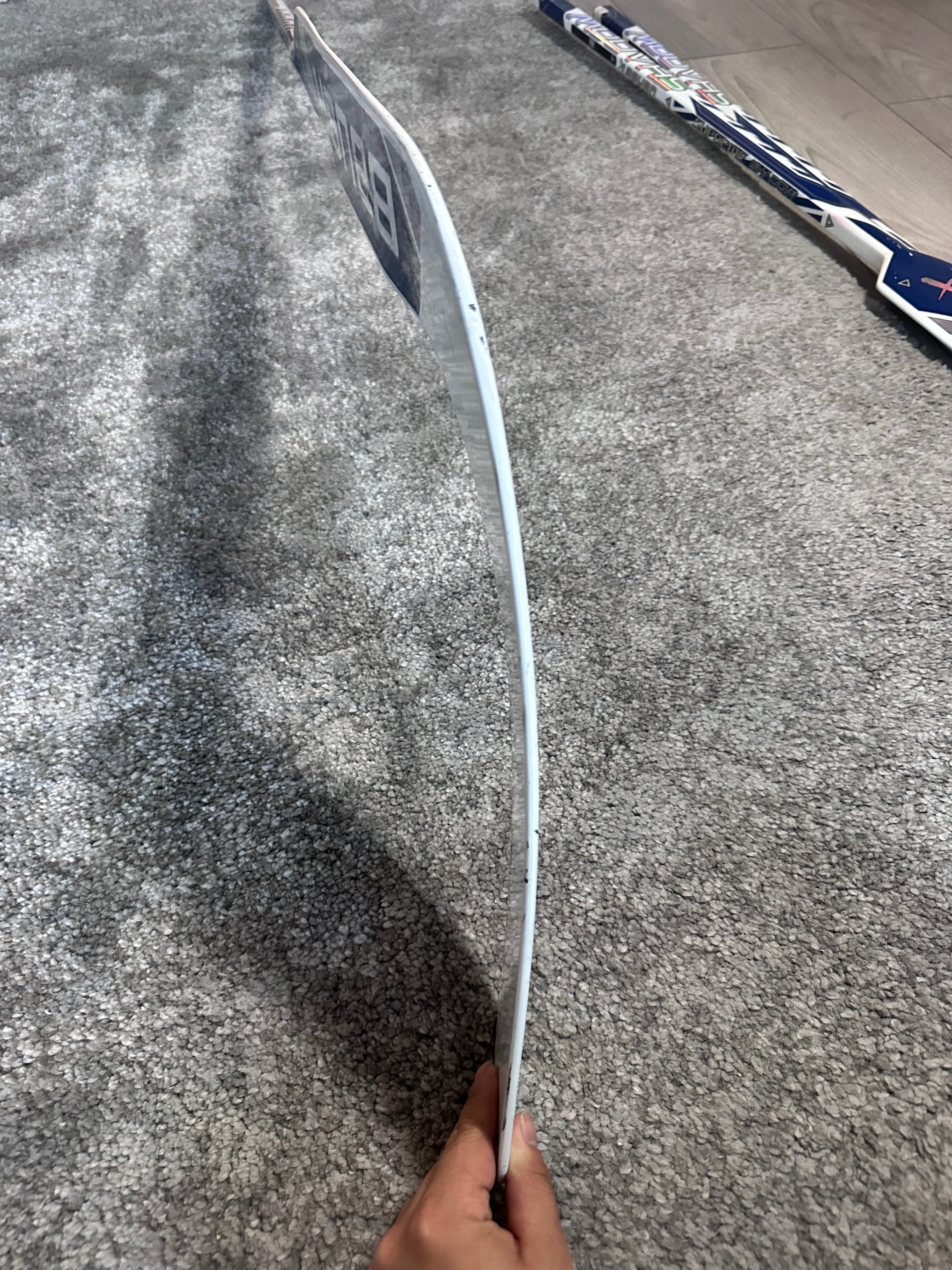 NCAA Bauer Shadow Full Right 24" White Pro Stock Goalie Stick #4