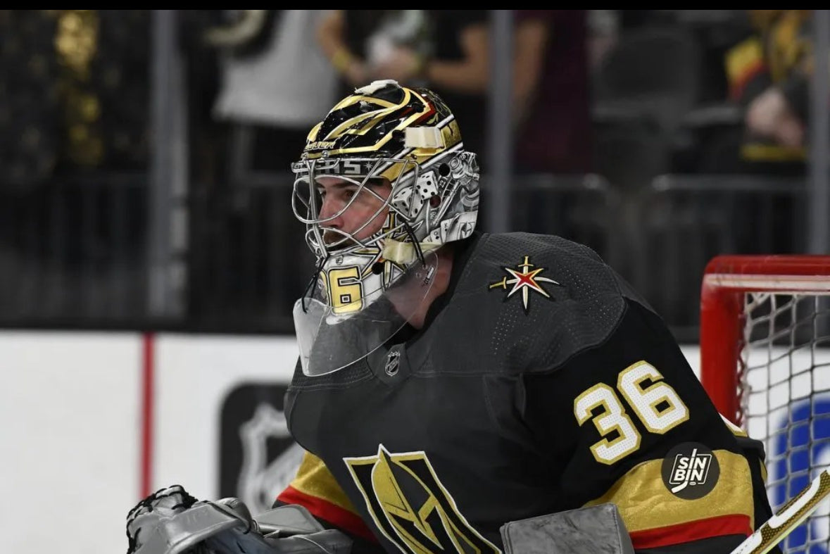 Logan Thomson replica goalie mask with 24k plated cage